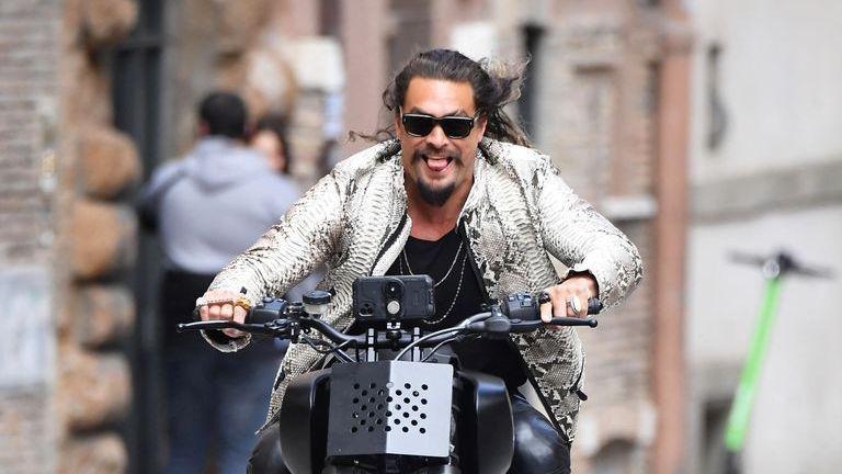 Jason Momoa on a motorbike in Rome