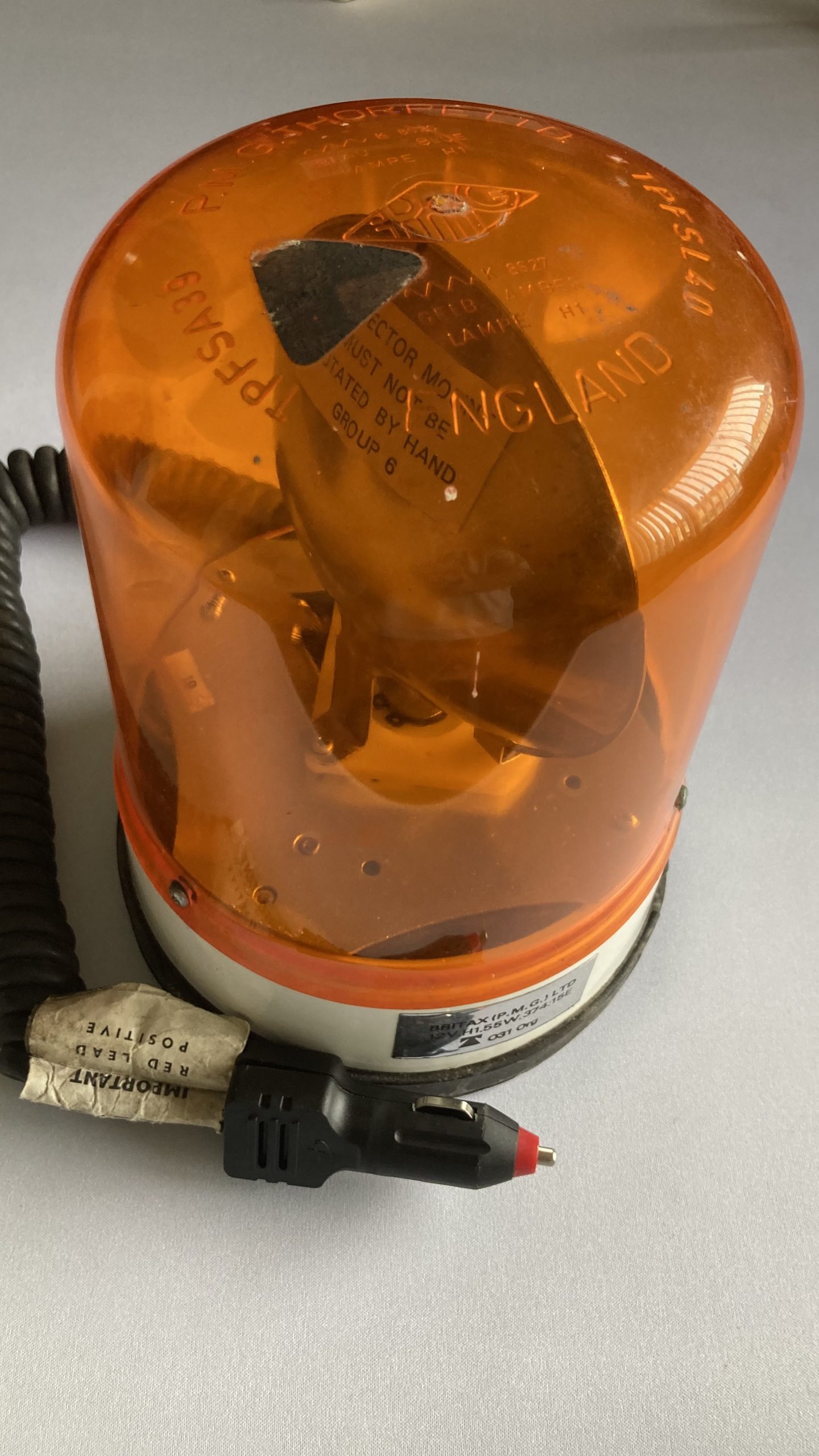 Adam's Tat - a rotating amber beacon