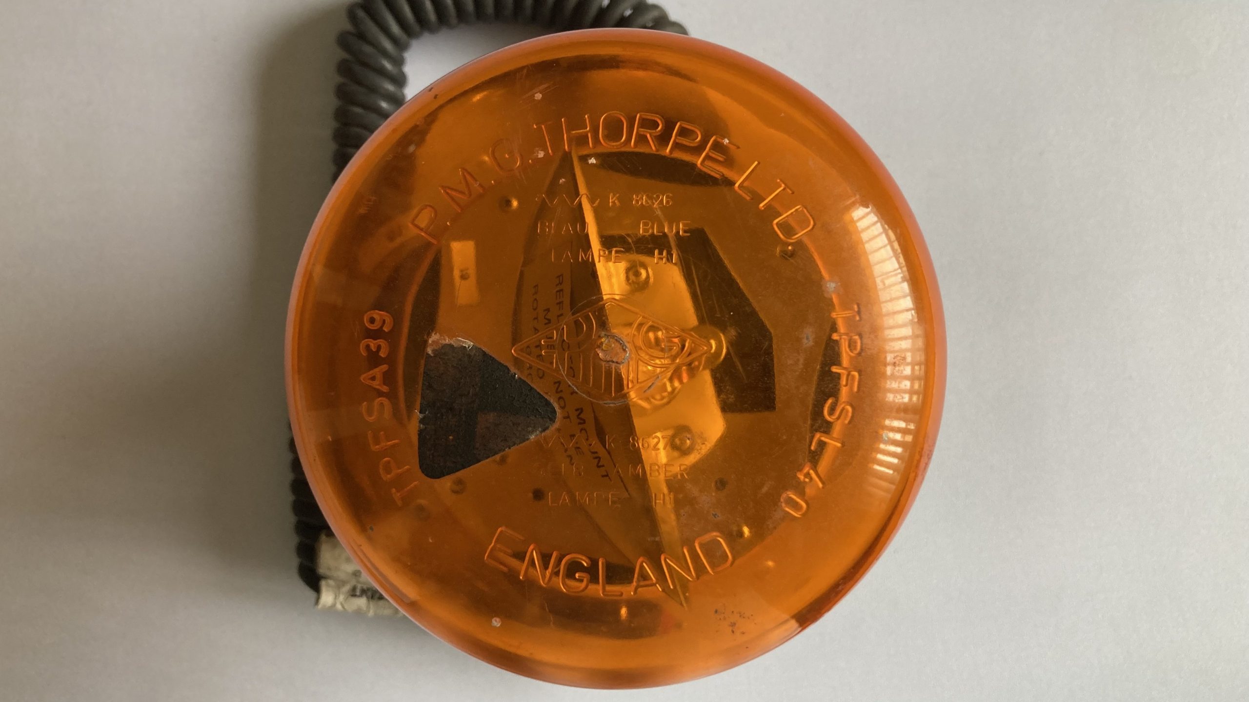 Adam's Tat - a rotating amber beacon