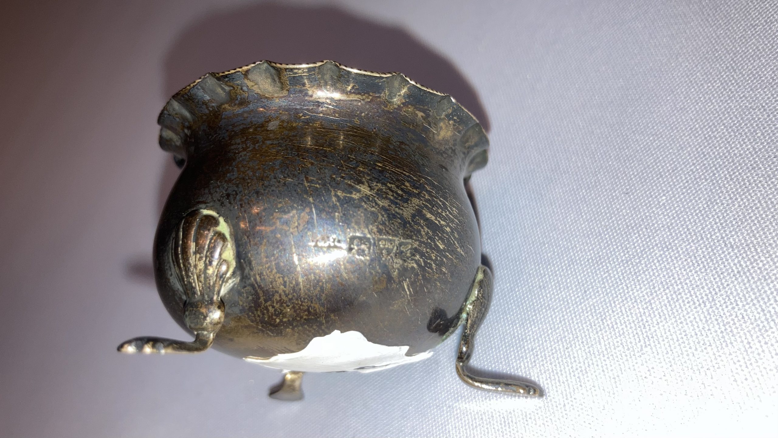 The maker's marks on Adam's tat