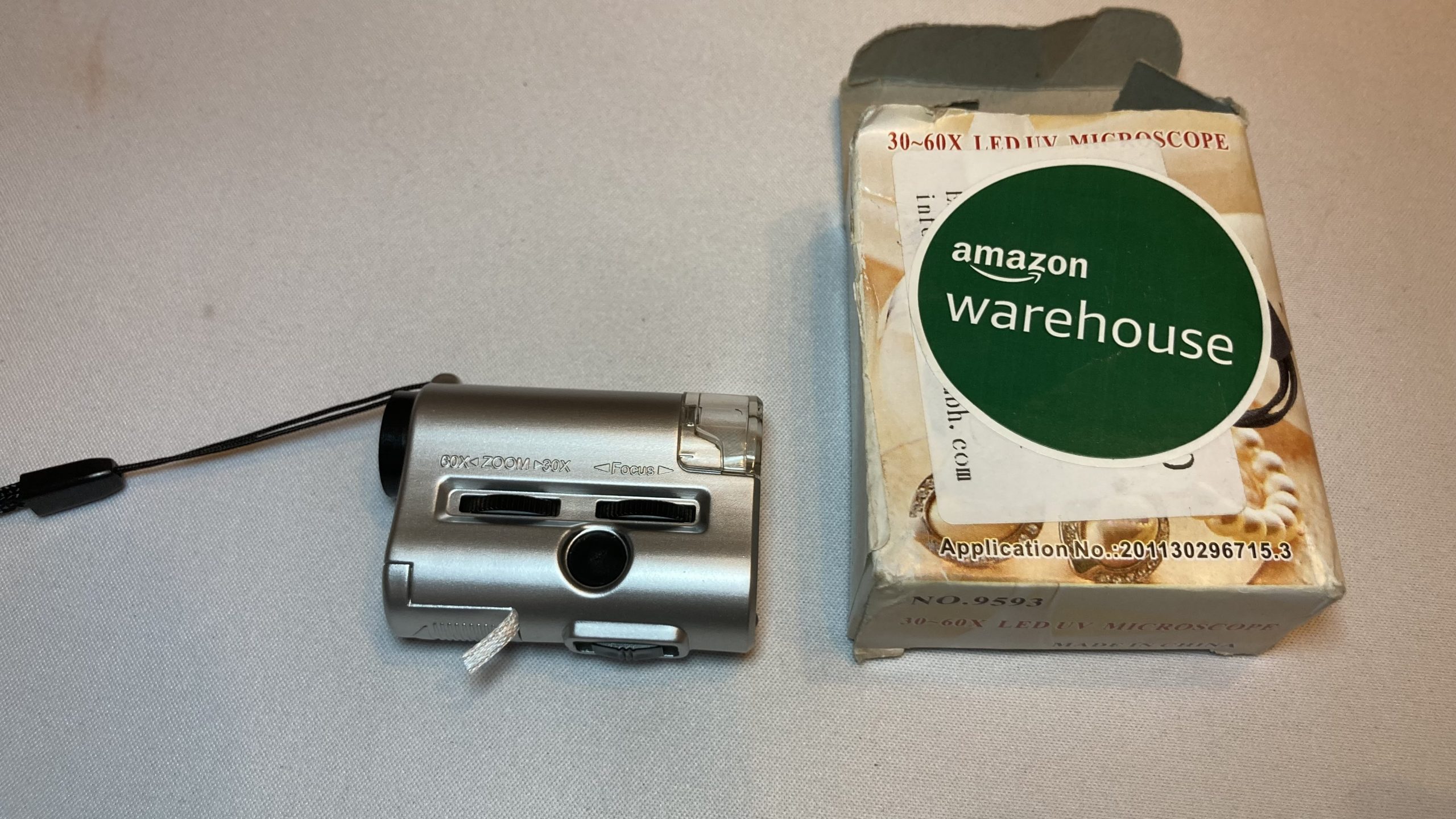 Adam's tat - a tiny UV LED microscope