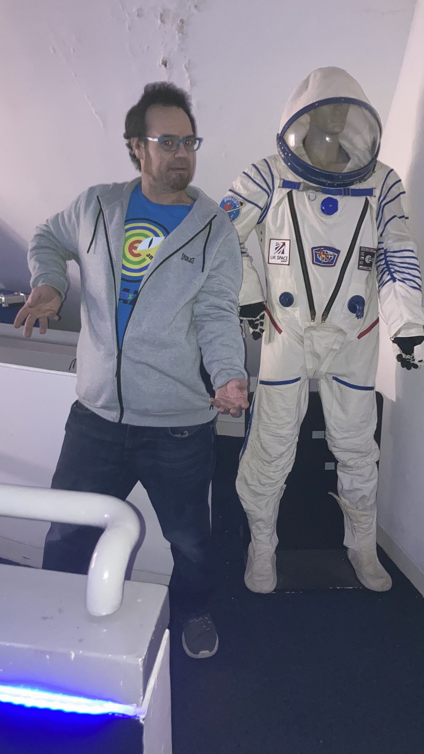 Techniquest - Adam with an awkwardly posed mannequin in a space suit