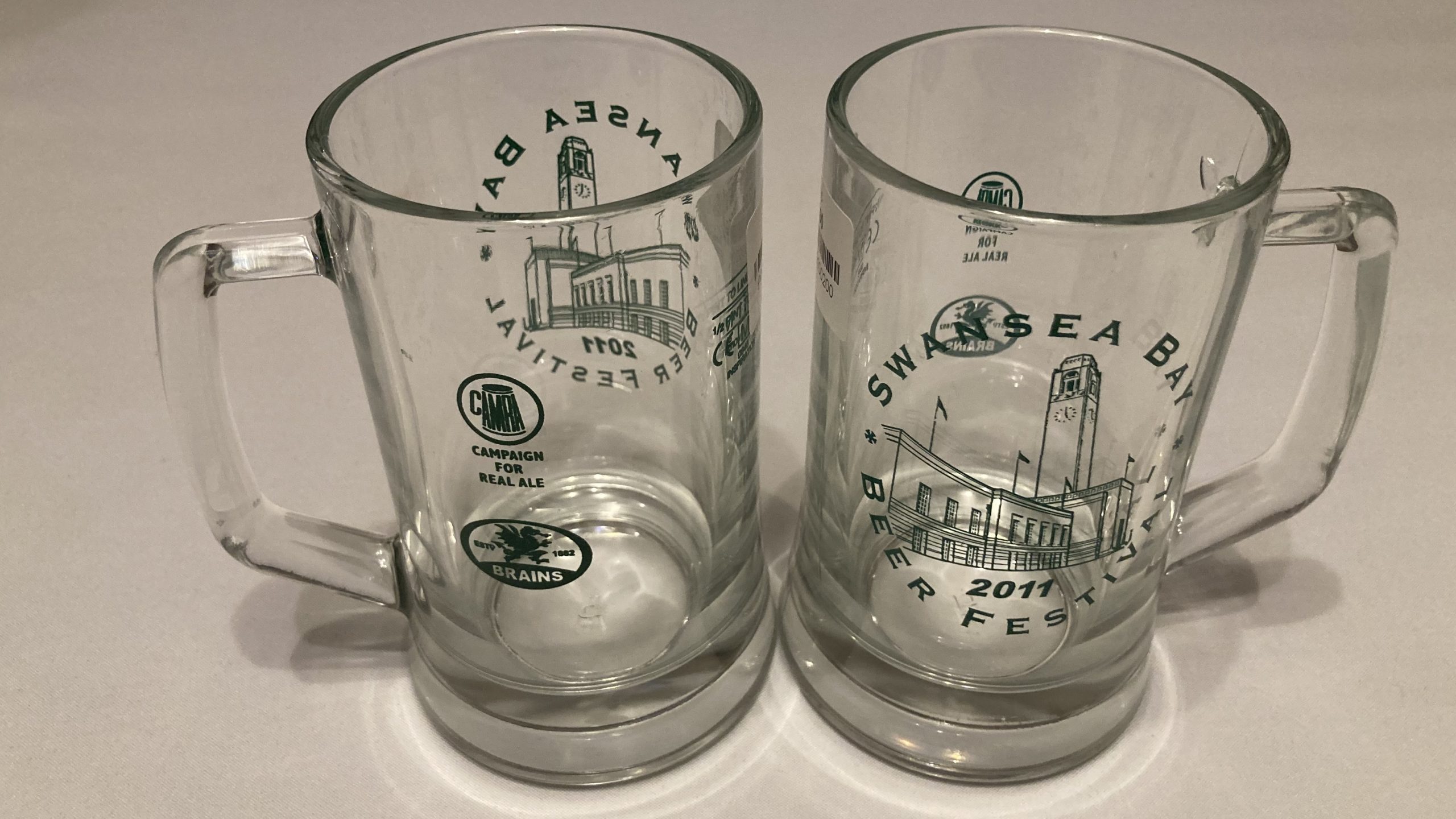 Karen's tat - a pair of matching 'Swansea Bay Beer Festival 2011' half-pint tankards