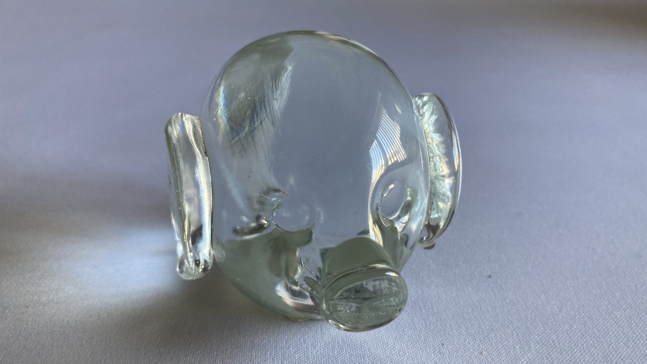 Karen's Tat, a glass...is it a pig? Maybe an elephant?