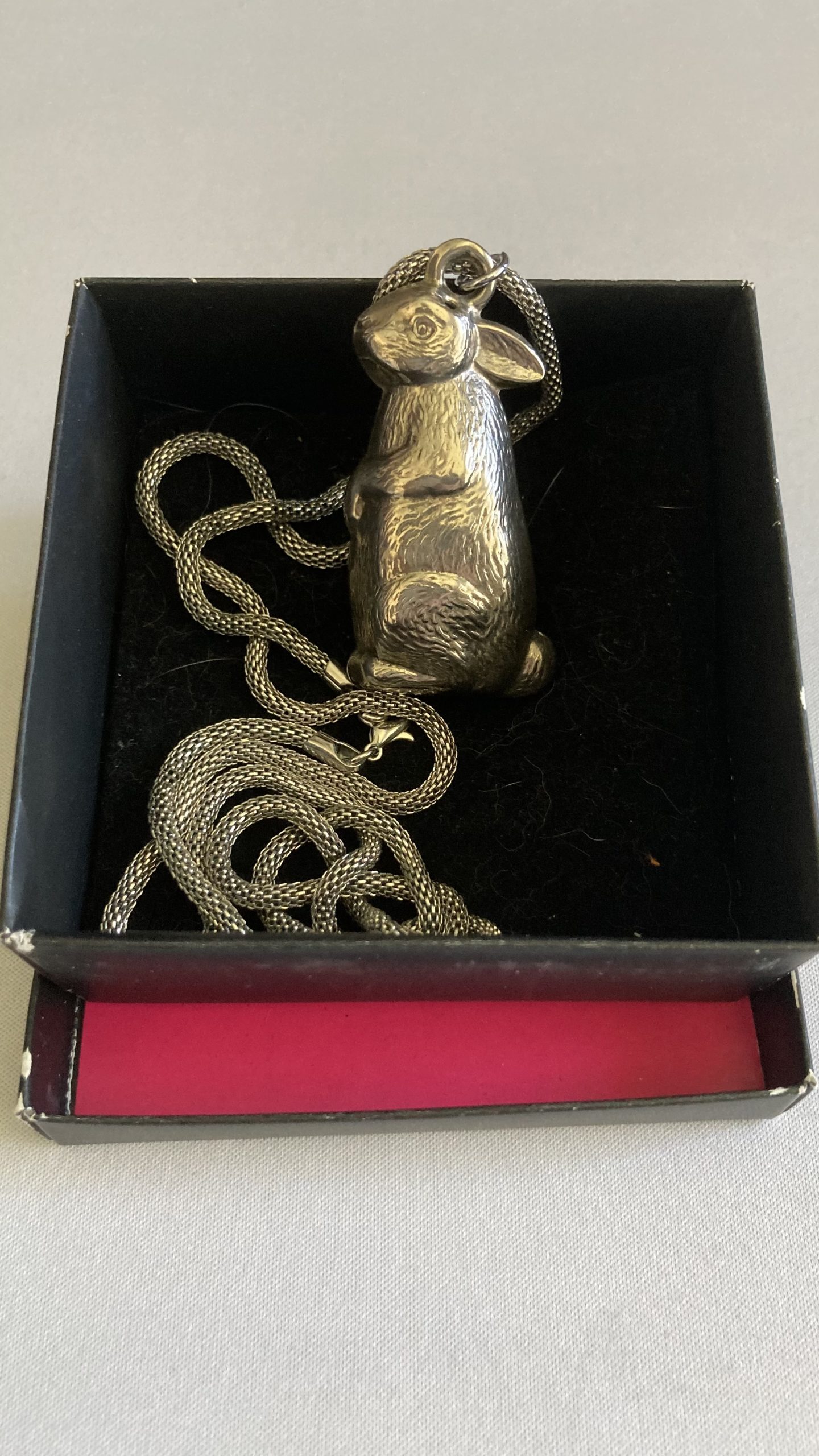 Karen's first tat item - an antique rabbit-shaped rattle
